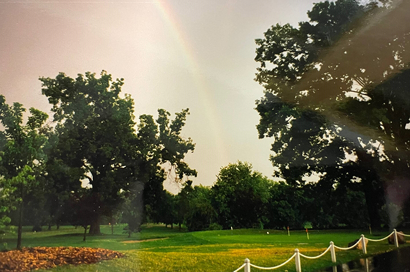 view of green with rainbow